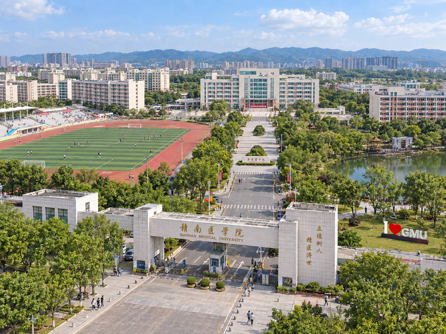 Gannan Medical University in Ganzhou from the air — the main gate, the sports ground and the campus lake